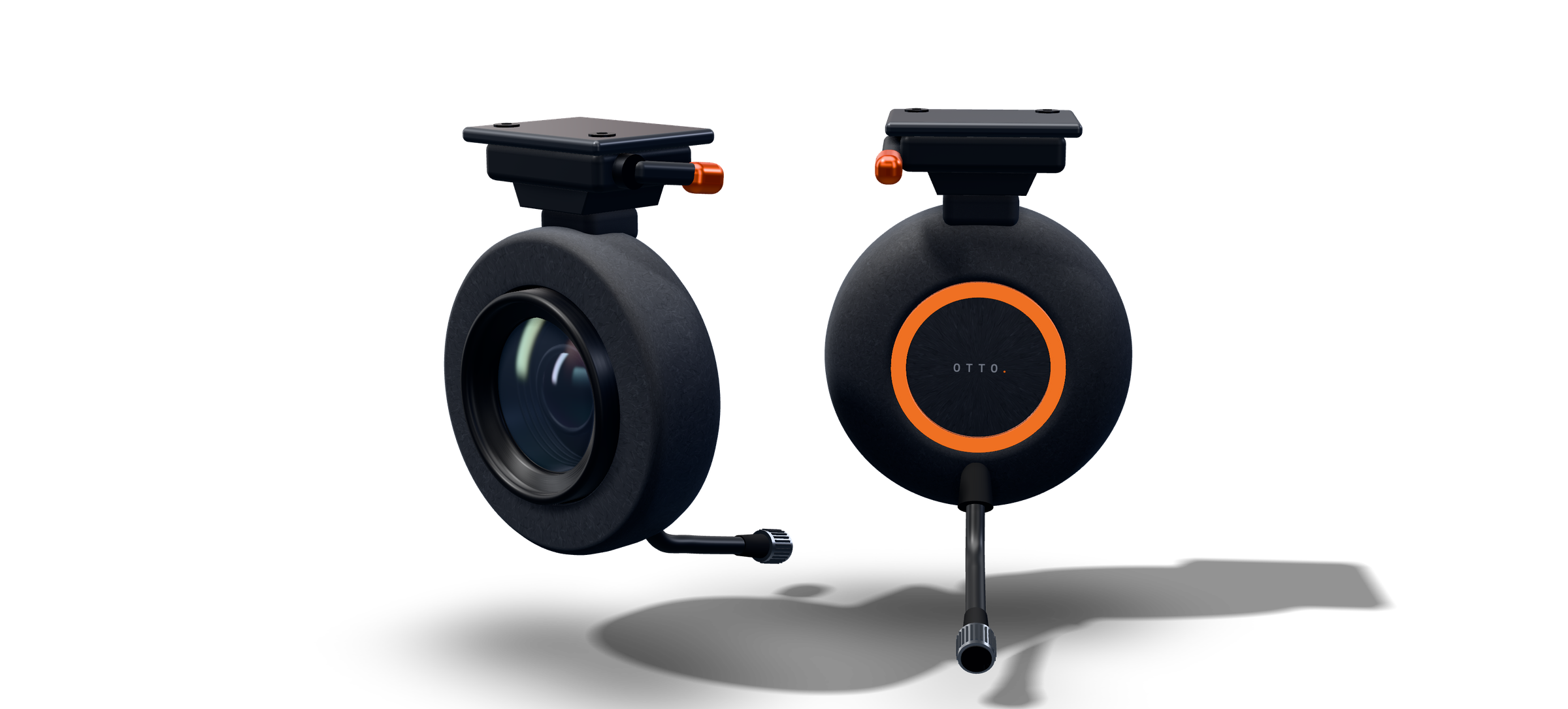 Render of the front and rear OTTO camera pods — matte carbon PP-CF pucks on quick-release mounts. One shows the large low-light lens behind a matte black hood; the other shows the cabin side, where the orange status ring faces the driver